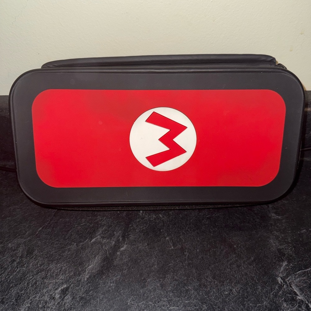 Nintendo Red and Black Mario Logo Travel Pouch